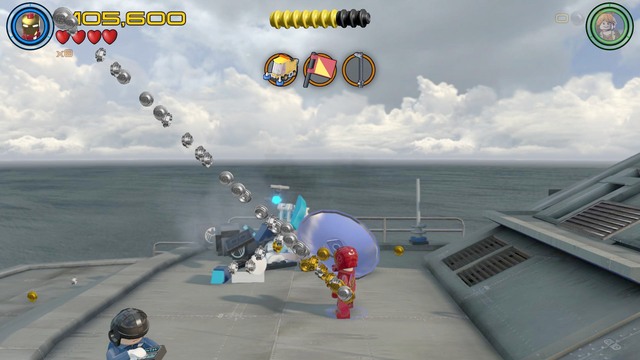 On the Helicarrier, on the roof where you found the flag you will locate a silver necklace - Stan Lee / Red brick - Shakespeare in the Park - secrets - LEGO Marvels Avengers - Game Guide and Walkthrough