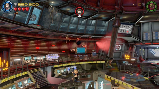 Walk to the place shown on the picture and destroy the glass cover on the top by using Hawkeyes arrow - Minikits - Helicarrier Havoc - secrets - LEGO Marvels Avengers - Game Guide and Walkthrough