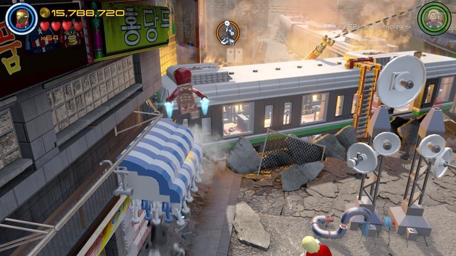 Fly as any character on the roof shown on the picture and jump on it until all the bricks fall out - Minikits - Korea Prospects - secrets - LEGO Marvels Avengers - Game Guide and Walkthrough