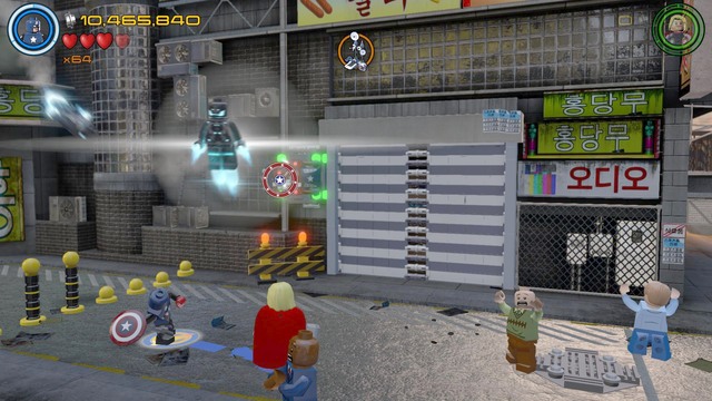 After constructing the first part of the device, walk to the left side where you will find a red car - Minikits - Korea Prospects - secrets - LEGO Marvels Avengers - Game Guide and Walkthrough