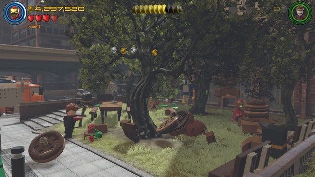 Walk to the right side where you will find acorns hanging from the trees - Minikits - Lack of Insight - secrets - LEGO Marvels Avengers - Game Guide and Walkthrough