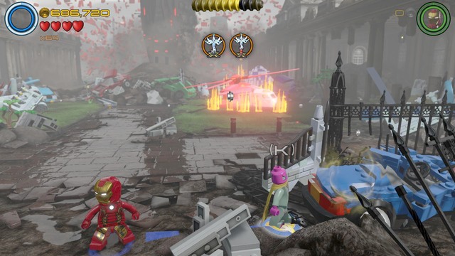 Ahead of the Collector there will be a wreck of the blue car - Stan Lee / Red brick - Lost in the Aether - secrets - LEGO Marvels Avengers - Game Guide and Walkthrough