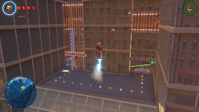 On the only glass building you will find another riddle - Golden bricks - North Manhattan - secrets - LEGO Marvels Avengers - Game Guide and Walkthrough