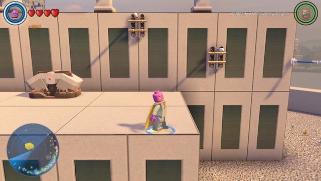 On the roof of a building in the eastern part of northern Manhattan you will find a container and handles with switches - Golden bricks - North Manhattan - secrets - LEGO Marvels Avengers - Game Guide and Walkthrough