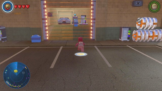 Destroy the silver containers on the right side by using explosives - Golden bricks - Southern Manhattan - secrets - LEGO Marvels Avengers - Game Guide and Walkthrough