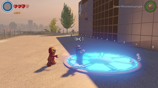 Near Avengers base you will find a cover under which there is a character token - Superior Iron Man - Races / Characters - Southern Manhattan - secrets - LEGO Marvels Avengers - Game Guide and Walkthrough