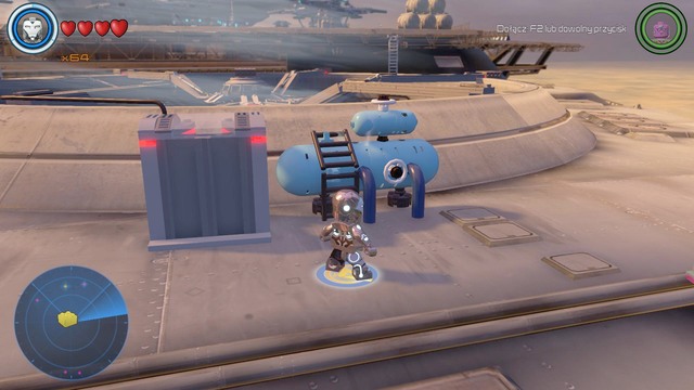 On the left side of the Helicarrier you will find a blue brick object that you must destroy - Golden bricks - S.H.I.E.L.D. Helicarrier - secrets - LEGO Marvels Avengers - Game Guide and Walkthrough