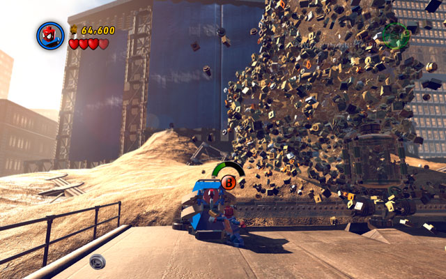 Approach blue-red panel on the left with Spider-Man and use spiders web to unlock a switch - Sand Central Station | Walkthrough - Walkthrough - LEGO Marvel Super Heroes Game Guide & Walkthrough