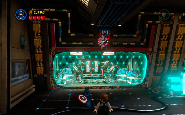 After the beginning of the mission toss Captain Americas shield at the patriotic panel located above - Rebooted, Resuited | Walkthrough - Walkthrough - LEGO Marvel Super Heroes Game Guide & Walkthrough