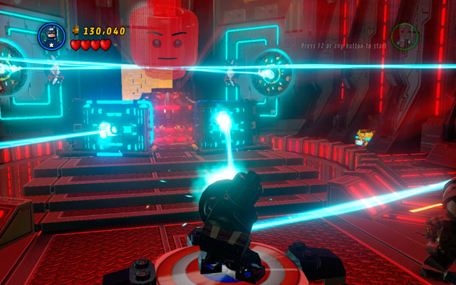 In new location defeat all enemies, then approach to two panels located at the end of the room and toss a shield at them - Rebooted, Resuited | Walkthrough - Walkthrough - LEGO Marvel Super Heroes Game Guide & Walkthrough
