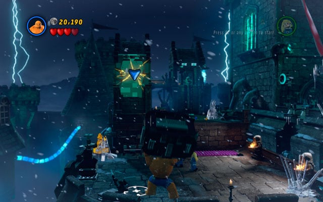 Land at the one of the castle towers, then fight the enemies crowded nearby - Doctor in the House | Walkthrough - Walkthrough - LEGO Marvel Super Heroes Game Guide & Walkthrough