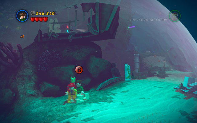 When the column is collapsed, switch into Sandman and pass through the sandbox to catch a minikit - That Sinking Feeling | Minikit Sets - Minikit Sets - LEGO Marvel Super Heroes Game Guide & Walkthrough