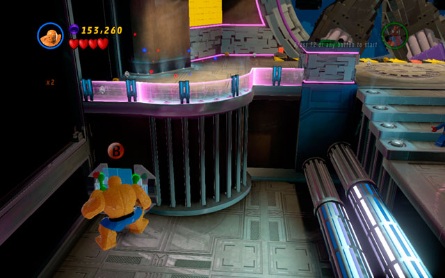 In the room with a huge gate (with the space abyss hidden inside) turn left and yank two green handles using a big character - A Doom With a View | Minikit Sets - Minikit Sets - LEGO Marvel Super Heroes Game Guide & Walkthrough