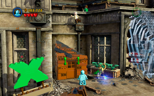 Go to the balcony of the X-Man school and turn right, heading to the burning box - The Main Campaign | Stan Lee in Peril - Stan Lee in Peril - LEGO Marvel Super Heroes Game Guide & Walkthrough