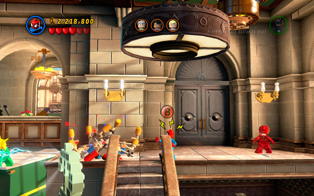 Jump on the balustrade as Spider-Man and use your spider sense to find two handles - A Shock Withdrawal | Maps - Maps - LEGO Marvel Super Heroes Game Guide & Walkthrough