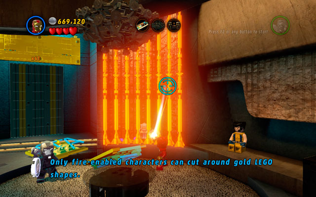 To rescue Stan Lee, walk to the right side of the room and melt the gold bars with a fire beam - House Party Protocol | Deadpool Bonus Missions: Collectables - Deadpool Bonus Missions: Collectables - LEGO Marvel Super Heroes Game Guide & Walkthrough