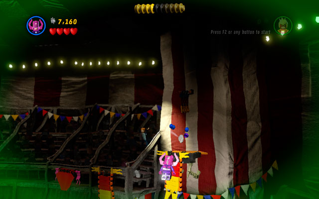 Choose any character with flying skills and go to the right part of the arena - Stunt Show Surprise | Deadpool Bonus Missions: Collectables - Deadpool Bonus Missions: Collectables - LEGO Marvel Super Heroes Game Guide & Walkthrough