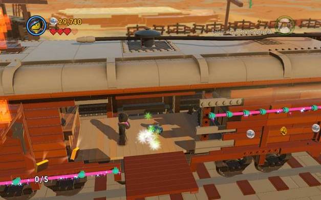 The Golden manual appears after you destroy the robot - Old West - The story mode - The LEGO Movie Videogame - Game Guide and Walkthrough