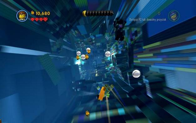 Manual page inside the tunnel - Flatbush Gulch - Golden manuals and pants - The LEGO Movie Videogame - Game Guide and Walkthrough