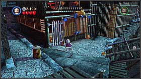 Bottle 3 - At the beginning of the level turn left and pass the fish seller - Singapore - bottles - At World's End - LEGO Pirates of the Caribbean: The Video Game - Game Guide and Walkthrough