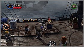 The first thing you need to do is to throw few objects to the bucket standing in the middle of the deck - Maelstrom - walkthrough - At World's End - LEGO Pirates of the Caribbean: The Video Game - Game Guide and Walkthrough