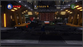 Use a character with explosives (for example Cad Bane) and go to the room to the left of the hangar [M2 - Red Bricks - Separatist Ship - Other - LEGO Star Wars III: The Clone Wars - Game Guide and Walkthrough