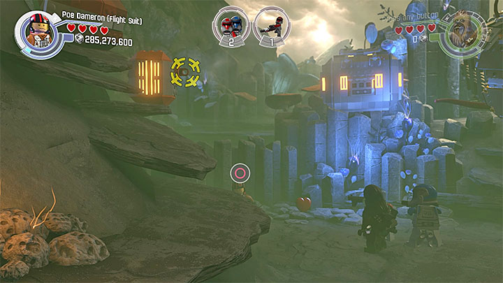 Hang on the handle that is located on the left from the rathtar cage - Rathtar Hunting | Minikits and red bricks - Minikits and red LEGO bricks - LEGO Star Wars: The Force Awakens Game Guide