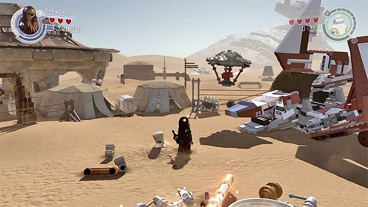 Wait for the red LEGO brick drop. - Chapter 3 - Niima Outpost | Minikits and red bricks - Minikits and red LEGO bricks - LEGO Star Wars: The Force Awakens Game Guide