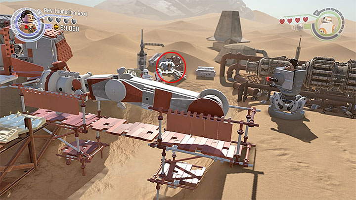 The third and the last bird can be found after reaching the place where you can construct a stationary cannon and use it to shoot at the bridge - Chapter 3 - Niima Outpost | Minikits and red bricks - Minikits and red LEGO bricks - LEGO Star Wars: The Force Awakens Game Guide