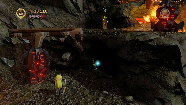 The Minikit is in a cave from which a couple Orcs went out - Prologue - Collectibles - LEGO The Lord of the Rings - Game Guide and Walkthrough