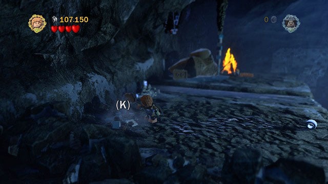 From where you fed the Troll, you have to move towards the camera, break the rocks and dig up the ground to pick up the treasure - The Pass of Caradhras - Collectibles - LEGO The Lord of the Rings - Game Guide and Walkthrough