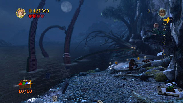 As you're fighting the monster, use the rope on the hook in the right side of the arena, climb up and destroy the plant - The Pass of Caradhras - Collectibles - LEGO The Lord of the Rings - Game Guide and Walkthrough