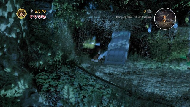 After pushing the stone hand down to the ground, break whatever remains of it and take the chest out of the niche - Amon Hen - p. 1 - Collectibles - LEGO The Lord of the Rings - Game Guide and Walkthrough