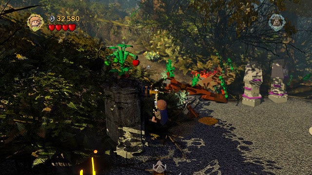 Tomatoes can be gathered by using the rope on the hook beside the bush and afterwards hitting the plant - Amon Hen - p. 1 - Collectibles - LEGO The Lord of the Rings - Game Guide and Walkthrough