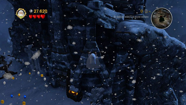 While by the bottom of the tower, jump to the left (at the edge of the screen you should see rails which will let you head back up) - Taming Gollum - Collectibles - LEGO The Lord of the Rings - Game Guide and Walkthrough