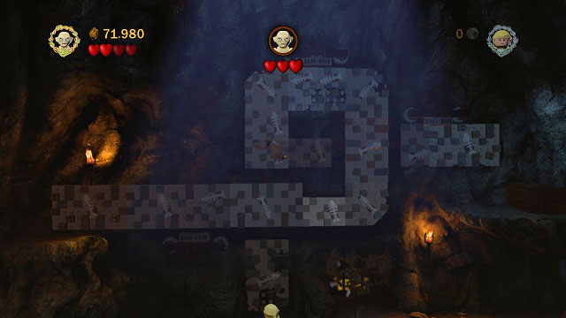 The second character should turn the right windlass and therefore let Gollum reach the chests on the rock ledge - Taming Gollum - Collectibles - LEGO The Lord of the Rings - Game Guide and Walkthrough