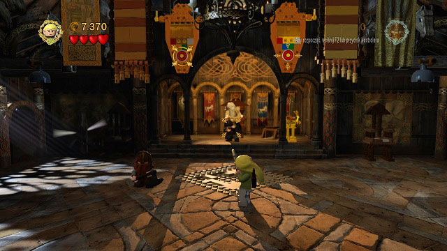 Shoot two targets on both sides of the throne and build a chest from the received bricks - Warg Attack - Collectibles - LEGO The Lord of the Rings - Game Guide and Walkthrough