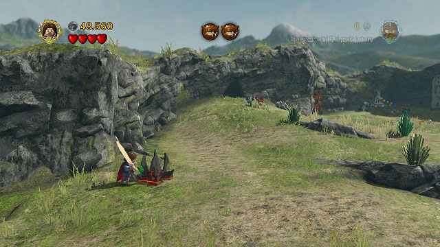 On the left side of the battlefield, a bit below Minikit #6 you will find a LEGO Morgul brick - Warg Attack - Collectibles - LEGO The Lord of the Rings - Game Guide and Walkthrough