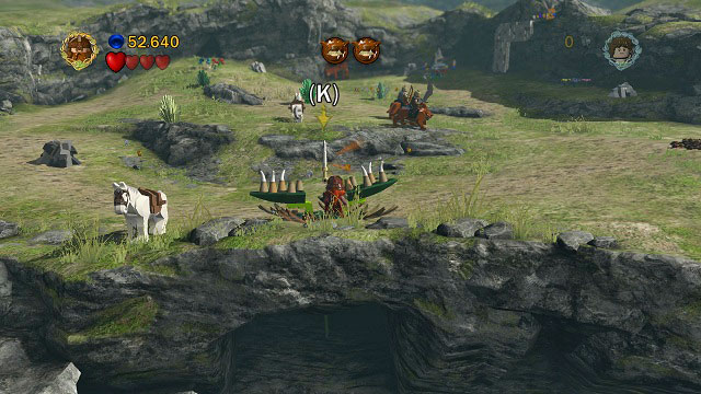 Illuminate it with the Phial of Galadriel and use the second character to pick up the treasure from inside the large sundew - Warg Attack - Collectibles - LEGO The Lord of the Rings - Game Guide and Walkthrough