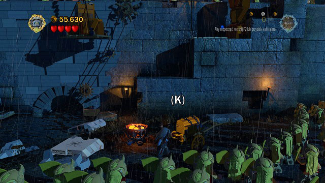 In the starting location, on the right side you have to pull the orange handle with Shagrat - Helms Deep - Collectibles - LEGO The Lord of the Rings - Game Guide and Walkthrough