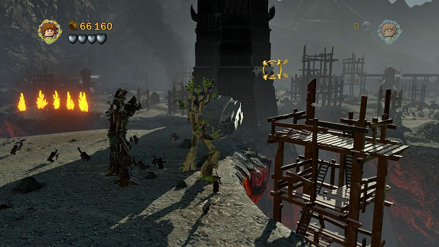 This time you have to destroy three fragments of Saruman's tower using the rocks - Osgiliath - Collectibles - LEGO The Lord of the Rings - Game Guide and Walkthrough