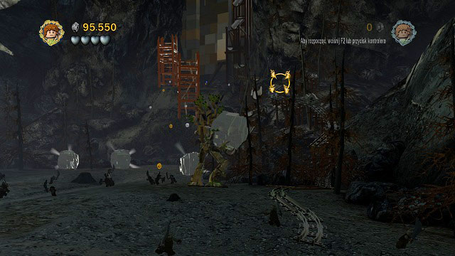 As you're moving towards the dam, on the right you will see train rails and at the very top a car - Osgiliath - Collectibles - LEGO The Lord of the Rings - Game Guide and Walkthrough