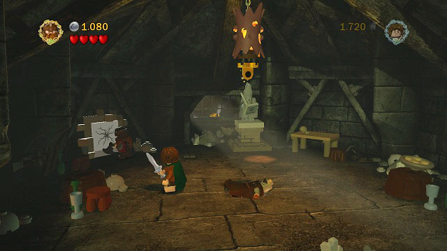 In the first location of the tower you have to destroy the cracked brick in the background and enter the breach in the wall - Cirith Ungol - Collectibles - LEGO The Lord of the Rings - Game Guide and Walkthrough
