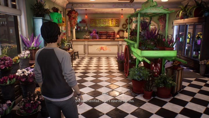 Suddenly, as Alex gets close to the door, the woman has a sudden attack of fear - Life is Strange True Colors: Flower Shop - walkthrough - Life is Strange True Colors: Chapter 2 Lanterns - Life is Strange True Colors Guide