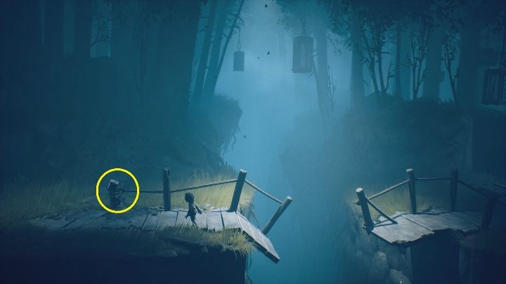 You must pull the string to lift a section of the bridge, which will allow Six to jump to the other side - Little Nightmares 2: Escaping the Hunter - Chapter 1 walkthrough - Chapter 1 - Forest - Little Nightmares 2 Guide