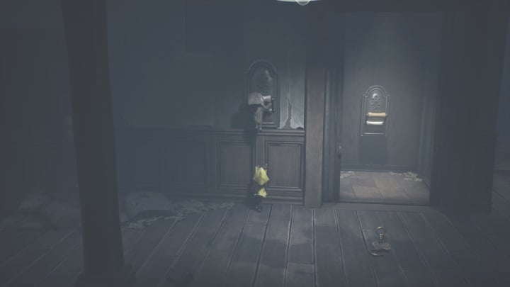 Six will boost you up to the lever so you can start the elevator again - Little Nightmares 2: Crossing the city - Chapter 4 walkthrough - Chapter 4 - Getting to the Tower - Little Nightmares 2 Guide