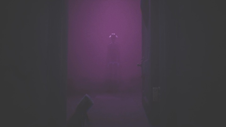 Eventually you will reach the door and be able to open it - Little Nightmares 2: Crossing the city - Chapter 4 walkthrough - Chapter 4 - Getting to the Tower - Little Nightmares 2 Guide