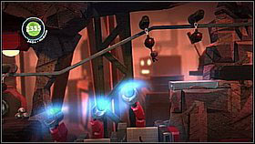 Above the multiplayer zone there's a shelf with bars - items have been hidden here as well - Bang for Buck - p. 2 - The Factory of a Better Tomorrow - LittleBigPlanet 2 - Game Guide and Walkthrough