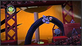 Destroy the cannon attached to the walls to get down - Full Metal Rabbit - The Cosmos - LittleBigPlanet 2 - Game Guide and Walkthrough