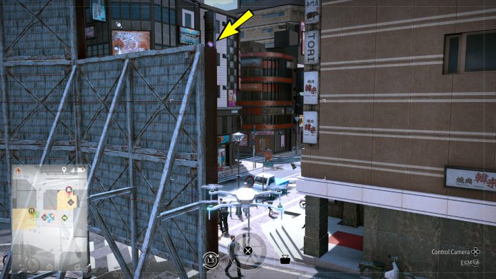 Using the drone, pick up the Camo Paint (Green) that is lying on top of the billboard - Lost Judgment: Squirrel search E Shichifuku - all squirrels, map - Kamurocho - Lost Judgment Guide